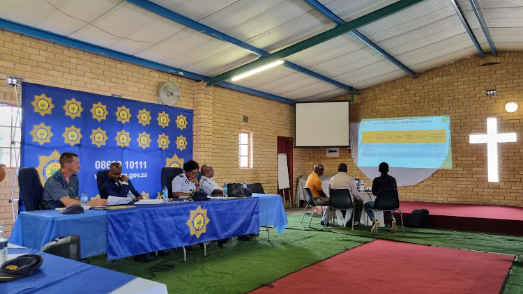 Police from Ekurhuleni district brief members of the Gauteng community safety committee during an oversight visit to Rabie Ridge.