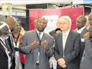 STATION MATTERS: Regional manager of Intercity Services of Western Cape Lindelo Maja, left, takes Deputy Minister of Transport Jeremy Cronin on a tour at the opening of Cape Town's refurbished train station. 02/12/2009. © Unknown.