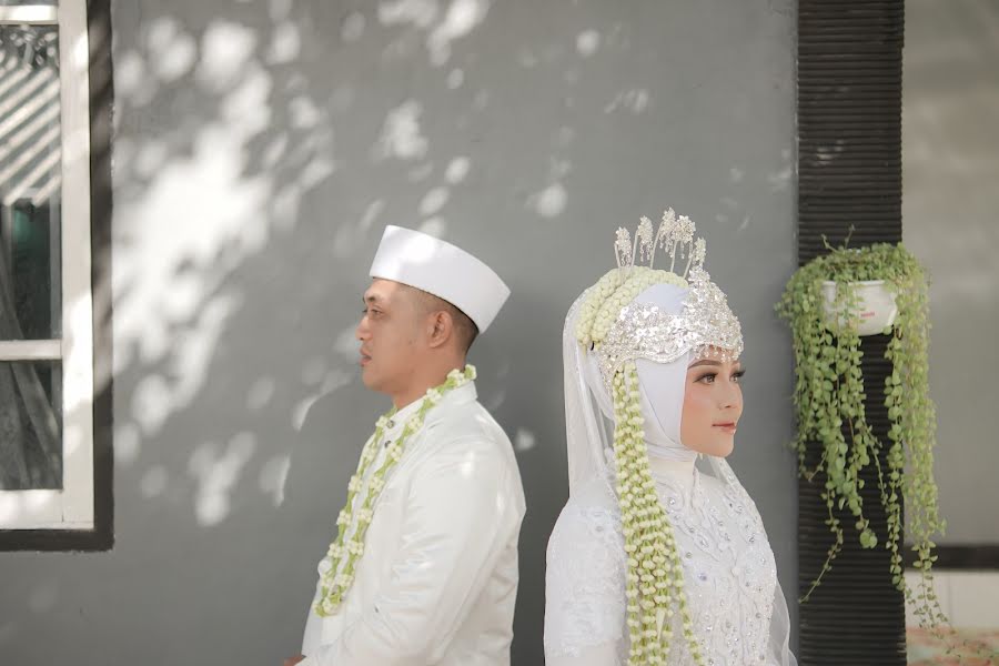 Fotograful de nuntă Hidayatulloh Azrin Azrin (azrinbluesimage). Fotografia din 27 aprilie 2023
