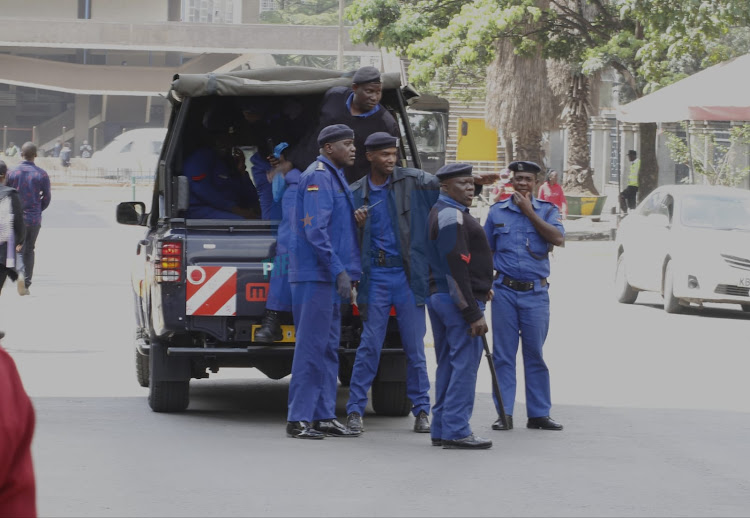 Police deployed at Parliament ahead of budget reading on April 7, 2022.