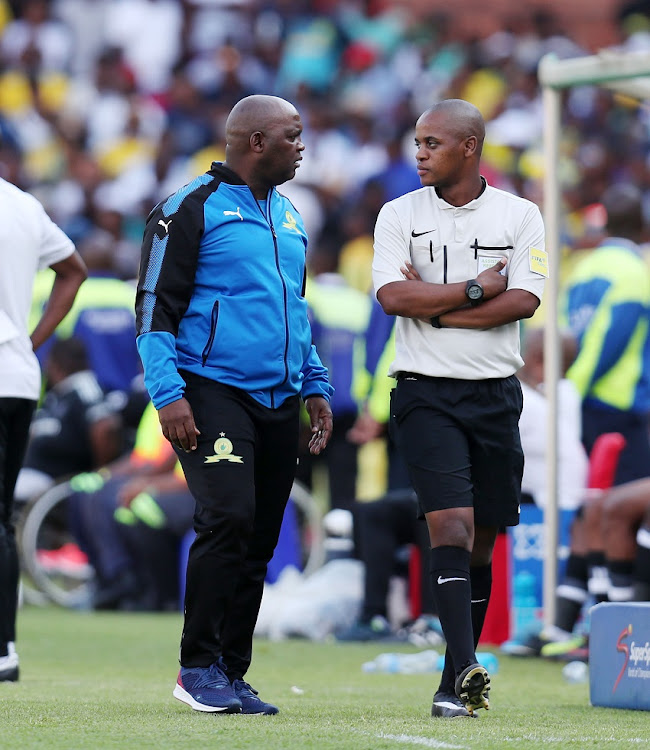 Pitso Mosimane, coach of Mamelodi Sundowns argues with the 4th Referee during the Absa Premiership 2017/18 match between Mamelodi Sundowns and Orlando Pirates at Loftus Versveld Stadium, Pretoria South Africa on 13 January 2018.