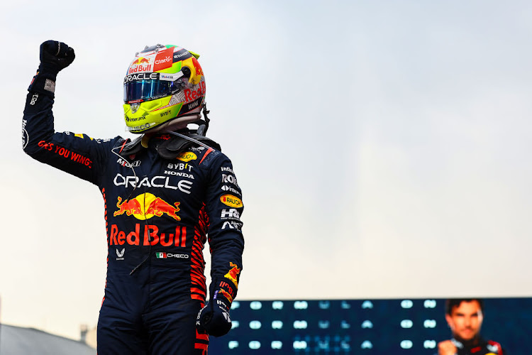 Sergio Perez celebrates in parc ferme after winning the F1 Grand Prix of Azerbaijan at Baku City Circuit on April 30, 2023 in Baku, Azerbaijan.