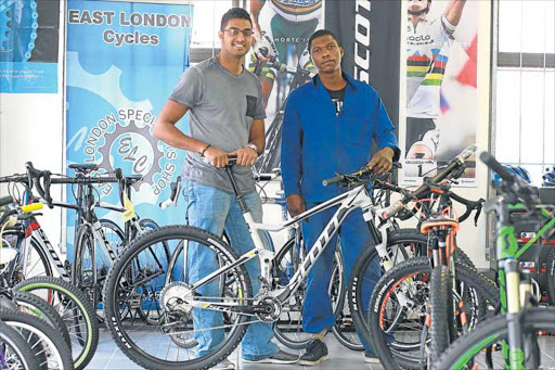 ALL PUMPED UP: East London Cycles' Thegan Govender, left, and Sinako Celani will be part of the technical team at the Daily Dispatch Cycle Tour and MTB Challenge on Saturday and Sunday Picture: MARK ANDREWS