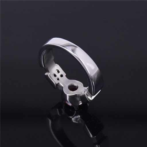 Title 3, Ruby Titanium Steel Four-Claw Diamond Ring. Sym...