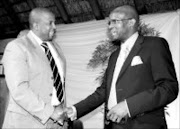 PARTNERSHIP: Mpumalanga Premier Thabang Makwetla with MC Vuyo Mbuli at the briefing on Wednesday. Pic. Andrew Hlongwane. 05/10/07. © Sowetan.