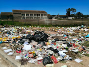 Rubbish has piled up next to Khwezi Lomso High School in Zwide, Port Elizabeth. 