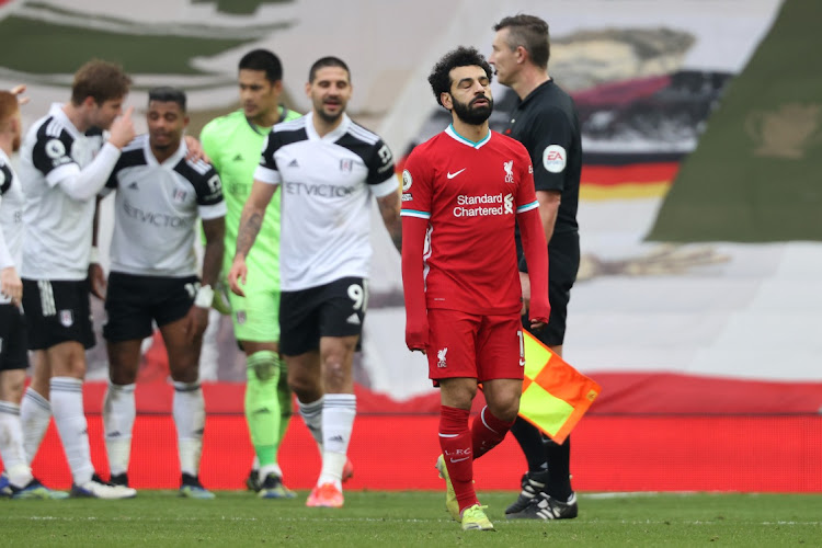 Mohamed Salah of Liverpool looks dejected after the English Premier League loss to Fulham at Anfield on March 7, 2021 in Liverpool