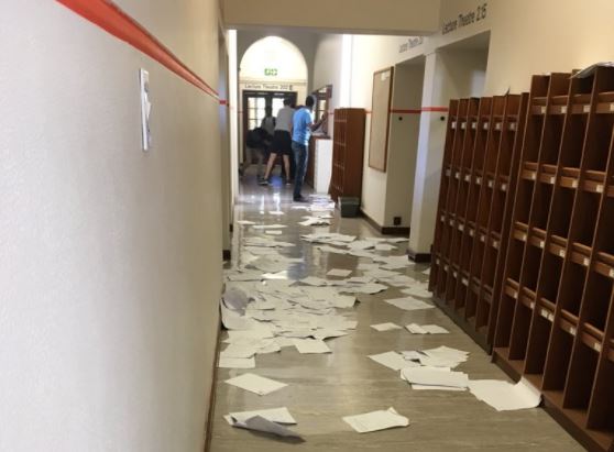 Test papers were scattered all over the corridors during the standoff between students and police.