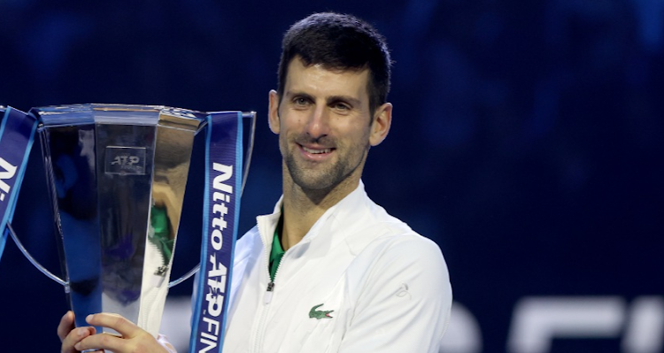 Novak Djokovic with the ATP Finals trophy. Picture: MATTHEW STOCKMAN/GETTY IMAGES