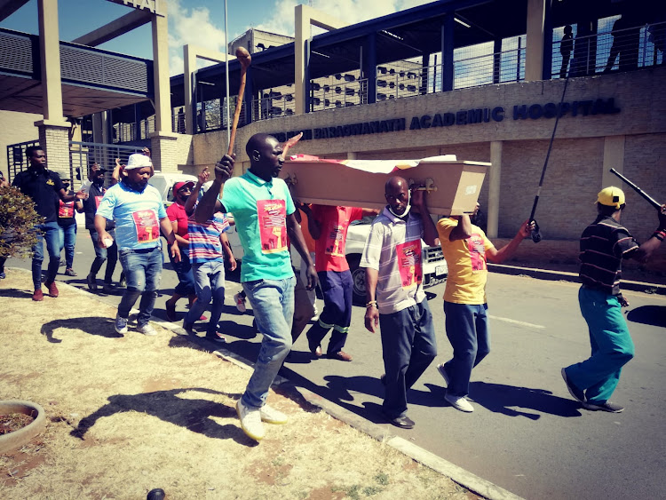 Members of the Unification Task Team (UTT) protested outside Baragwanath Academic Hospital in Soweto on Monday over long-standing grievances.