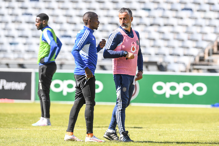 Orlando Pirates coach Jose Riveiro with player Thembinkosi Lorch during training at Orlando Stadium on August 2 2023.