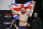 Former Ultimate Fighting Championship middleweight title holder Michael Bisping said he screamed and ran when confronted by homeless people in Cape Town.