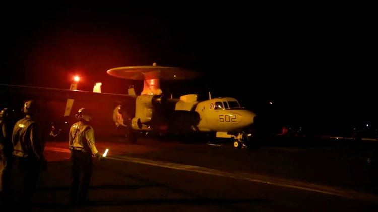 An aircraft takes off to join the US-led coalition operation against military targets in Yemen, aimed at the Iran-backed Houthi militia that has been targeting international shipping in the Red Sea, from an undisclosed location in this screengrab from a handout video released on January 12 2024.