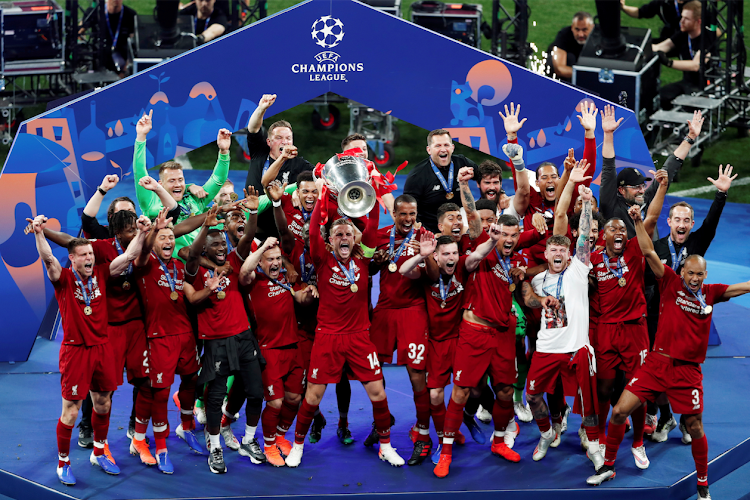 Liverpool players celebrate winning the Champions League