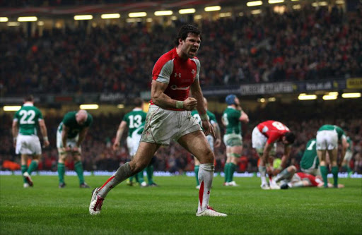 Mike Phillips of Wales celebrates at the end of the Six Nations match between Wales and Ireland at the Millennium Stadium on March 12th, 2011 in Cardiff, Wales