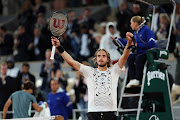 Stefanos Tsitsipas of Greece celebrates winning against Lorenzo Musetti of Italy in their first round match on day 3 of the French Open at Roland Garros in Paris on May 24 2022.