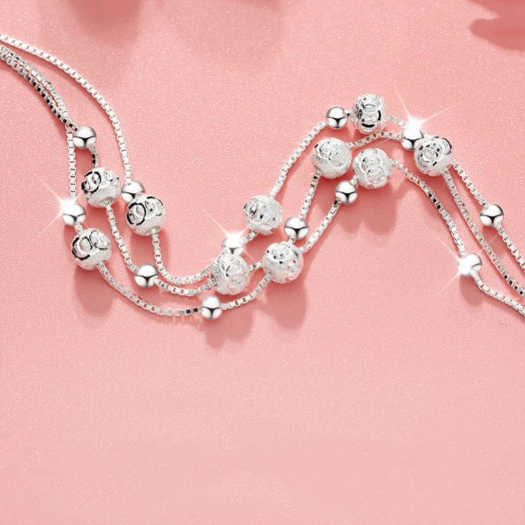 Zilveren transfer kralen armband dames meerlaags. Een stijlvol accessoire voor vrouwen, perfect om elke outfit compleet te maken.