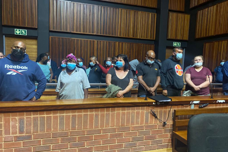 Some of the accused in the dock in connection with procurement corruption and fraud in the SA Police Service.