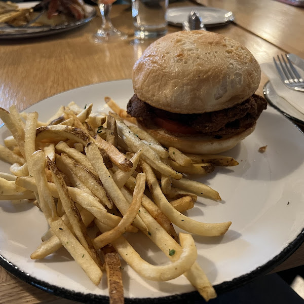 Chicken fried sandwich with fries