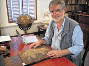 READING ROOM: British academic Dr David Culpin at the National Library of SA in Cape Town, where he came across a rare book about a shipwrecked crew's battle for survival