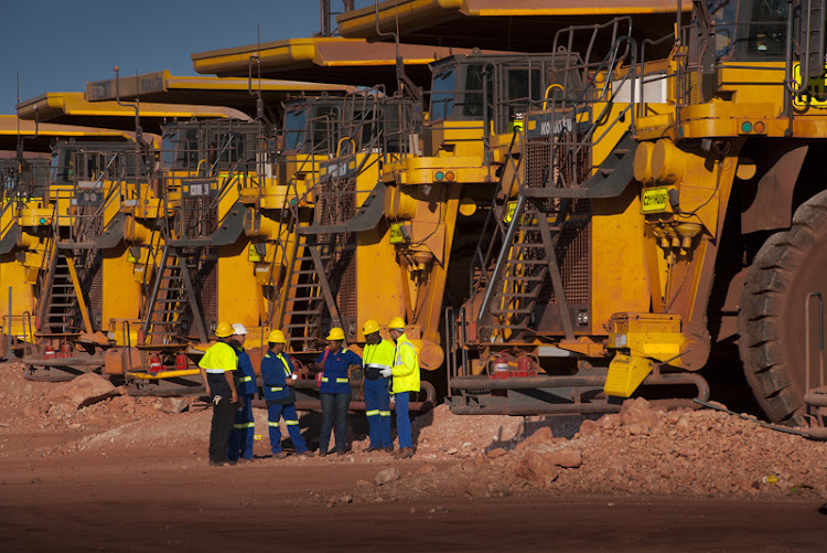 Anglo American will reduce production at its South African unit Kumba Iron Ore, where stockpiles have grown because of worsening rail bottlenecks. Pictured is Kumba's Sishen mine. File photo.