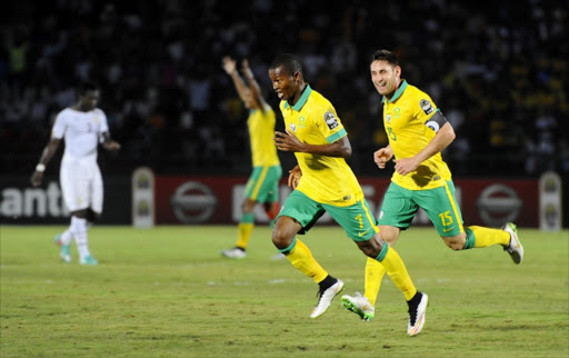 South Africa's Mandla Masango (7) celebrates his goal with his team mates during the 2015 African Cup of Nations Group C soccer match between South Afirca and Ghana at Mongomo Stadium. Picture Credit: Gallo Images