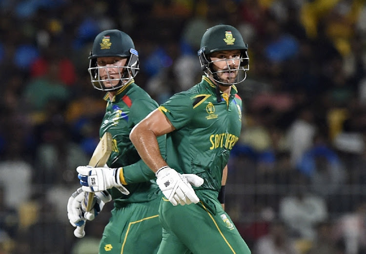 The Proteas' Aiden Markram and Rassie van der Dussen cross for a run in their ICC Cricket World Cup match against Pakistan at MA Chidambaram Stadium in Chennai, India, on Friday.