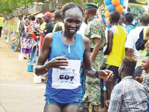 Flomena Cheyech after winning the Mully Half Marathon on Sunday. /COURTESY