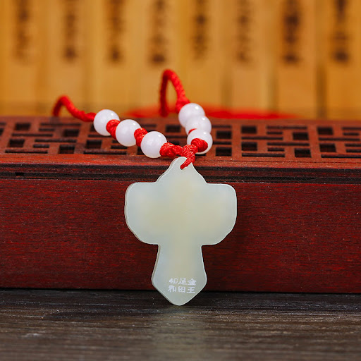 Title 3, Gold inlaid jade pendant
