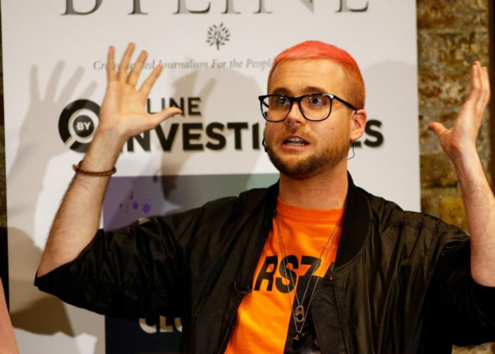 Christopher Wylie, a whistleblower who formerly worked with Cambridge Analytica, speaks next to Shahmir Sanni (not in picture), a former volunteer at Vote Leave group, at the Frontline Club in London, Britain, March 26, 2018.