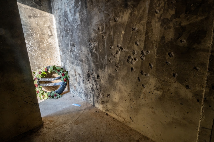 A wreath at the entrance of a bomb shelter near where the Super Nova party took place, in Be'eri, Israel, November 13 2023. Picture: ALEXI J ROSENFELD/GETTY IMAGES