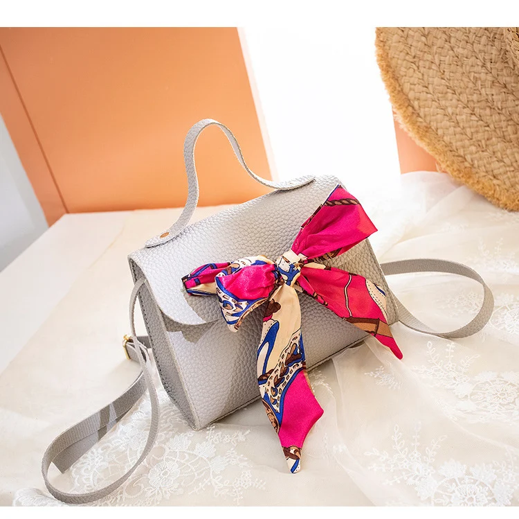 Petit sac carré avec nœud en ruban Sac à main Sac à bandoulière Idéal pour transporter vos essentiels avec style et confort en toutes occasions