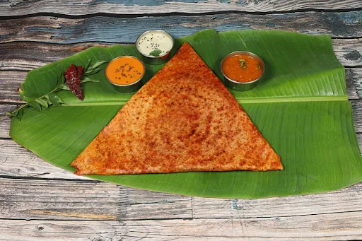 Butter Schezwan Onion Dosa