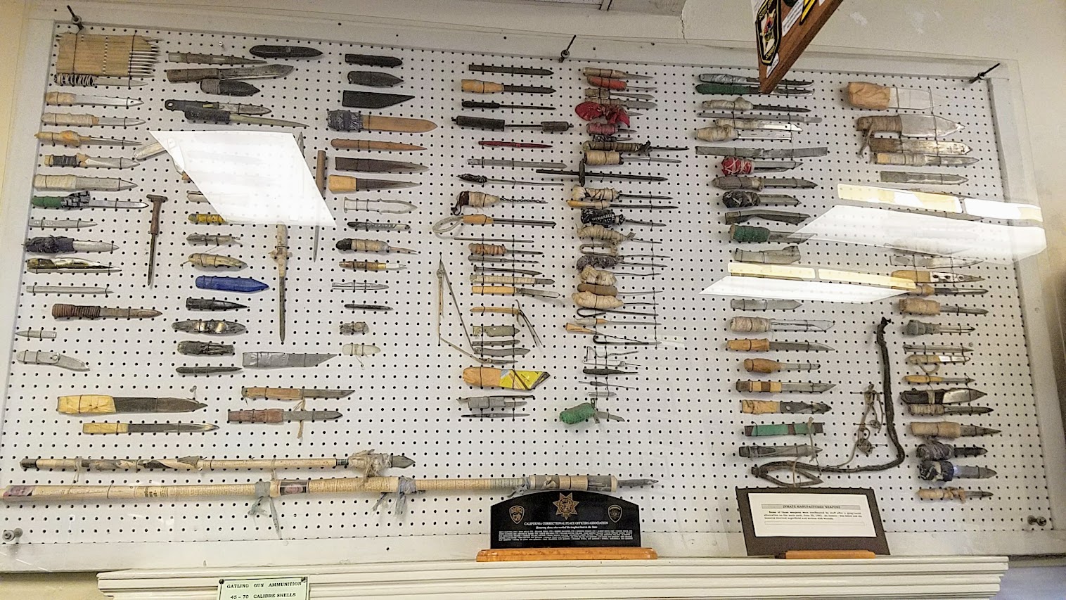 Weapons crafted by prisoners, from shivs to spears made by using rolled up wet soapy newspapers in a display at Folsom Prison Museum