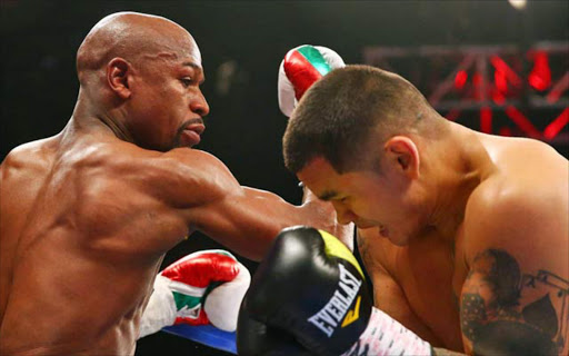 Floyd Mayweather in a fight with Marcos Maidana Picture: AFP