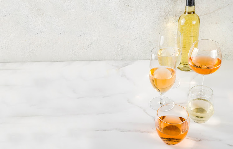 Orange wine is still made with grapes — not oranges — but has a deep orange-hued appearance due to its winemaking process.
