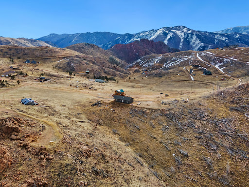Isolated house in arid mountain landscape in this luxury land for sale in Virginia Dale ($45,000 - 8,498 m²)