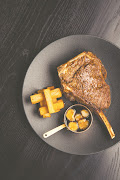 Viande's dry-aged prime rib, pomme pont neuf (Parisian fried potatoes) and sauce Bordelaise.