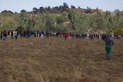 Members of the community combed the area to search for illegal miners. 