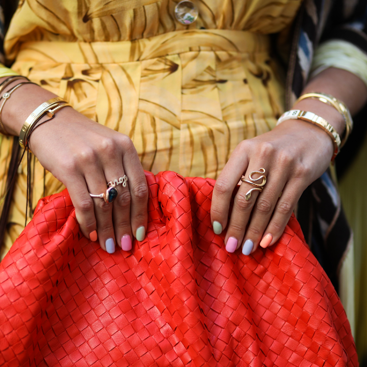 Multi-coloured nail art.