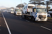 Traffic officials impound vehicles during last month’s violent taxi strike in Cape Town.