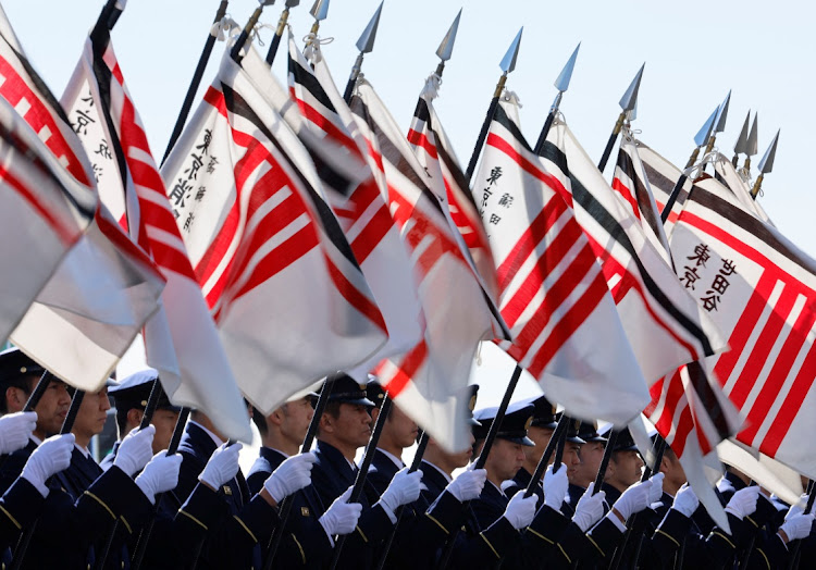 Firefighters take part in the Tokyo Fire Department's New Year's Fire review in Tokyo. ISSEI KATO/REUTERS