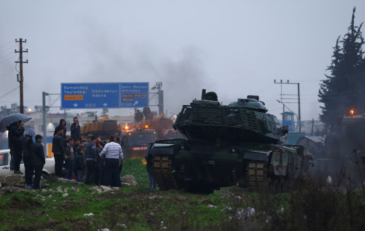 A Turkish military convoy arrives at an army base in the border town of Reyhanli near the Turkish-Syrian border in Hatay province, Turkey January 17, 2018.