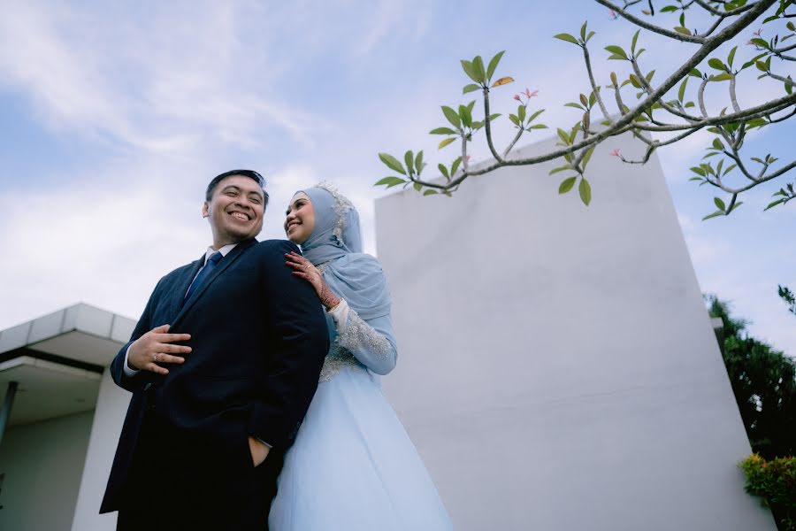 結婚式の写真家Zulfadhli Zainudin (symbiotic)。2023 8月8日の写真