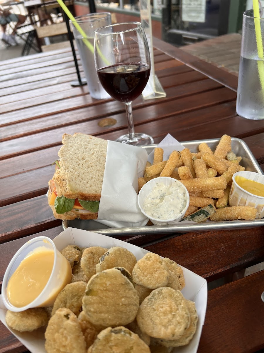 Turkey pesto sandwhich, zucchini fries, and fried pickles!