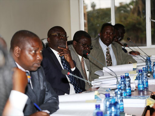 Siaya Governor Cornel Rasanga (2nd L) appears before the Senate Public Accounts and Investments Committee to answer audit queries on August 11 last year / HEZRON NJOROGE