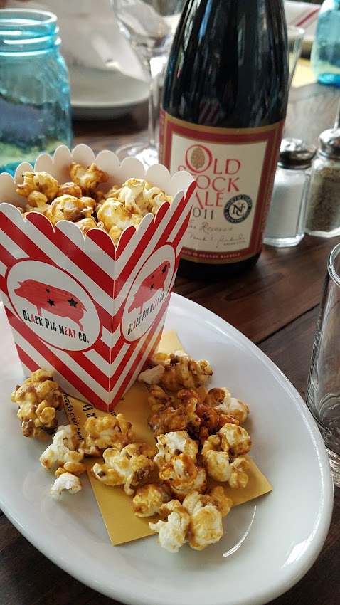 Lunch highlighting local cheeses with Chef Duskes Estes at zazu kitchen + farm, part of the Artisan Cheese Festival tour visiting the Barlow in Sebastopol. Starter of their signature black pig bacon caramel popcorn (they are known for their pigs and bacon here) at Zazu