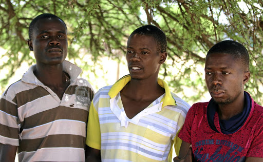 Mike Hlanganiso, left, Admore Masango and Livious Ndlovu are frequently subjected to assault.