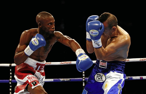 Zolani Tete in action with Omar Andres Narvaez at the WBO bantamweight title fight at the SSE Arena in Belfast, Northern Ireland, on Saturday. /Jason Cairnduff / Reuters