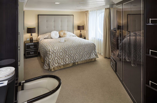 The bedroom of Vista Suite on Oceania's Sirena. Guests in all suites receive butler service on the ship.